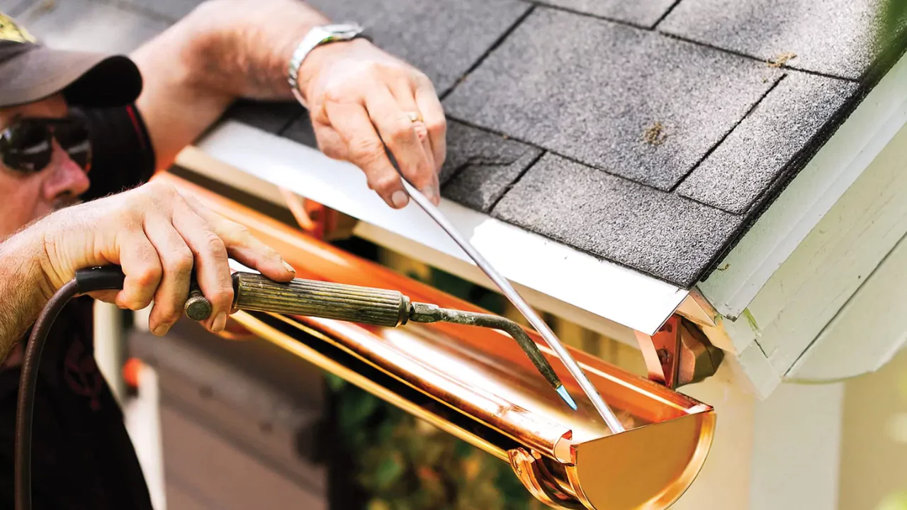 How to Clean Copper Gutters (Simple and Effective Methods) 5 Copper gutter cleaning by hand