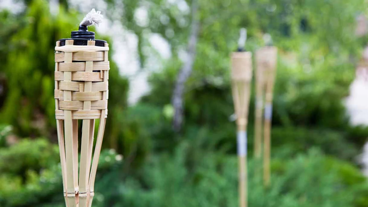 How to Create a Tiki Paradise in Your Backyard 2 Tiki torches for a backyard
